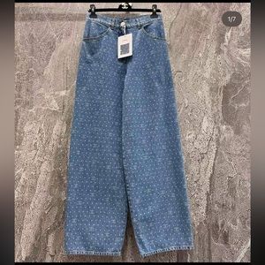 Chanel Logo Straight Leg Jeans